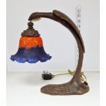 Contemporary bronzed cast metal Art Nouveau style table lamp and opaque glass shade, cast as a