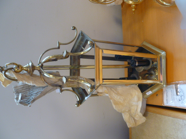 A 21st century brass electric brass ceiling light, hexagon , three candlestick fittings within for