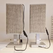 Pair of contemporary silver-painted table lamps and a contemporary Philippines basket-woven square
