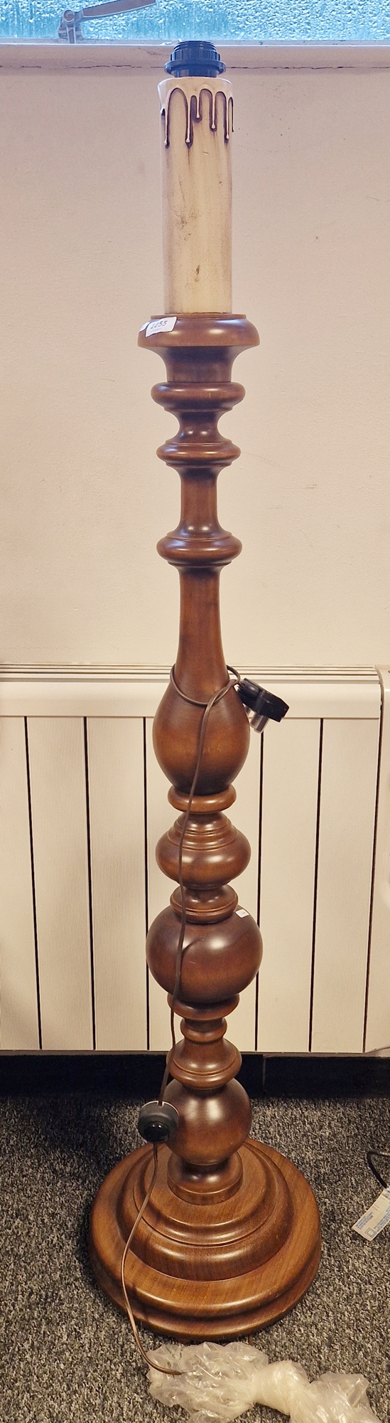 Contemporary Victorian-style wooden turned baluster standard lamp, with faux candlestick top, on