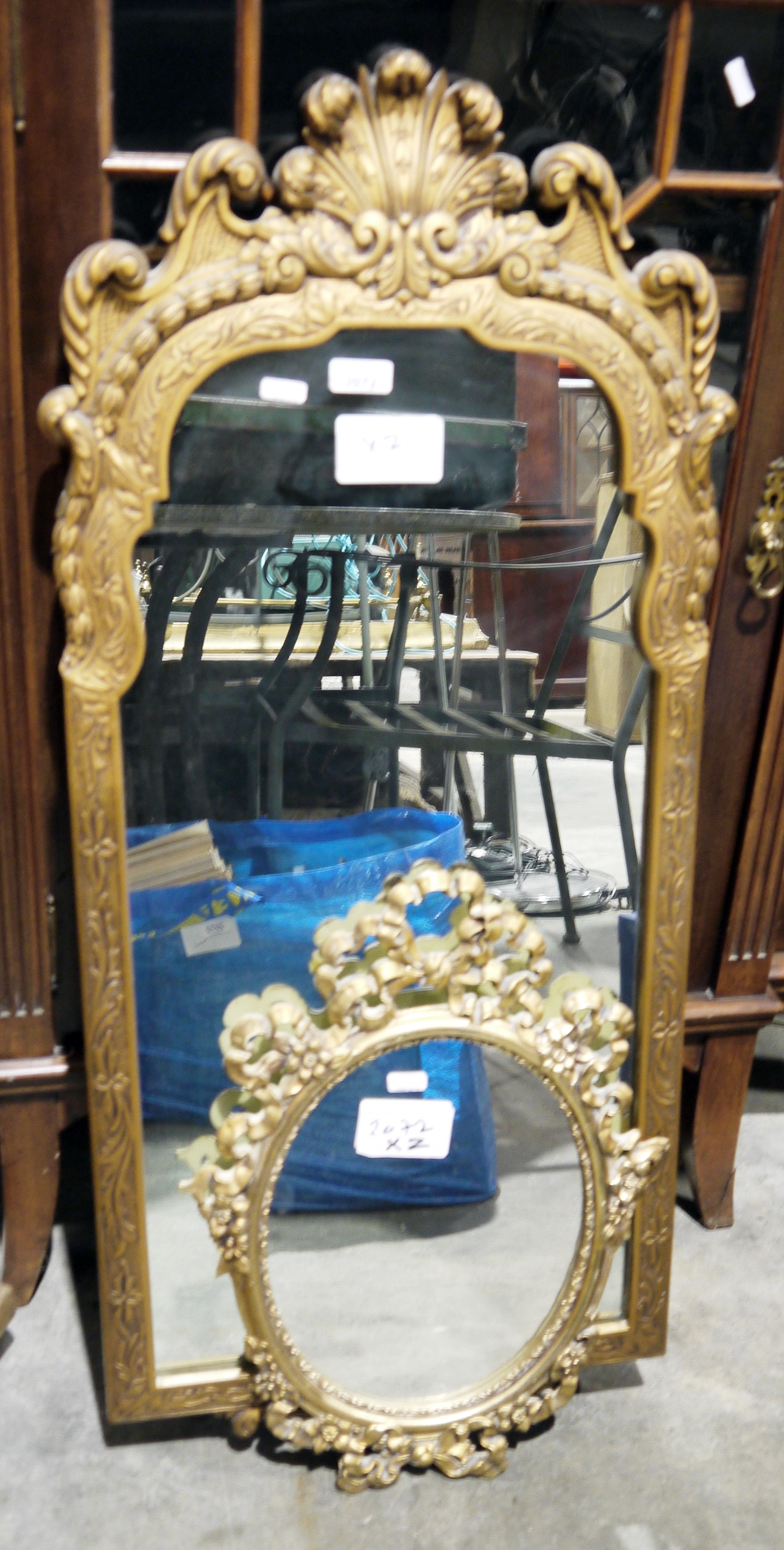 Small ornate gilt framed wall mirror and another larger gilt framed wall mirror Condition Report