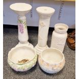 Two ceramic jardinieres, bowls on matching stands, one decorated with lilacs, the other with roses