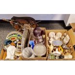 Various seashells to include two sea urchins, a wooden bowl with carved wooden fruit, a tree root