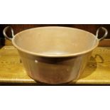 Large copper pan with wrought iron handles, 44cm diameter approx.