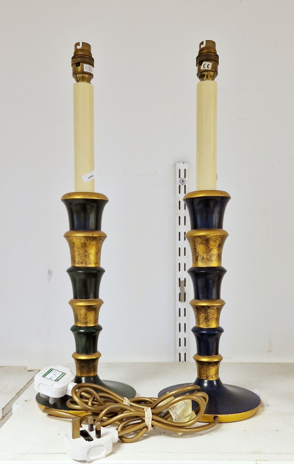 Pair of contemporary composite gilt and blue japanned table lamps, each with Art Deco graduating