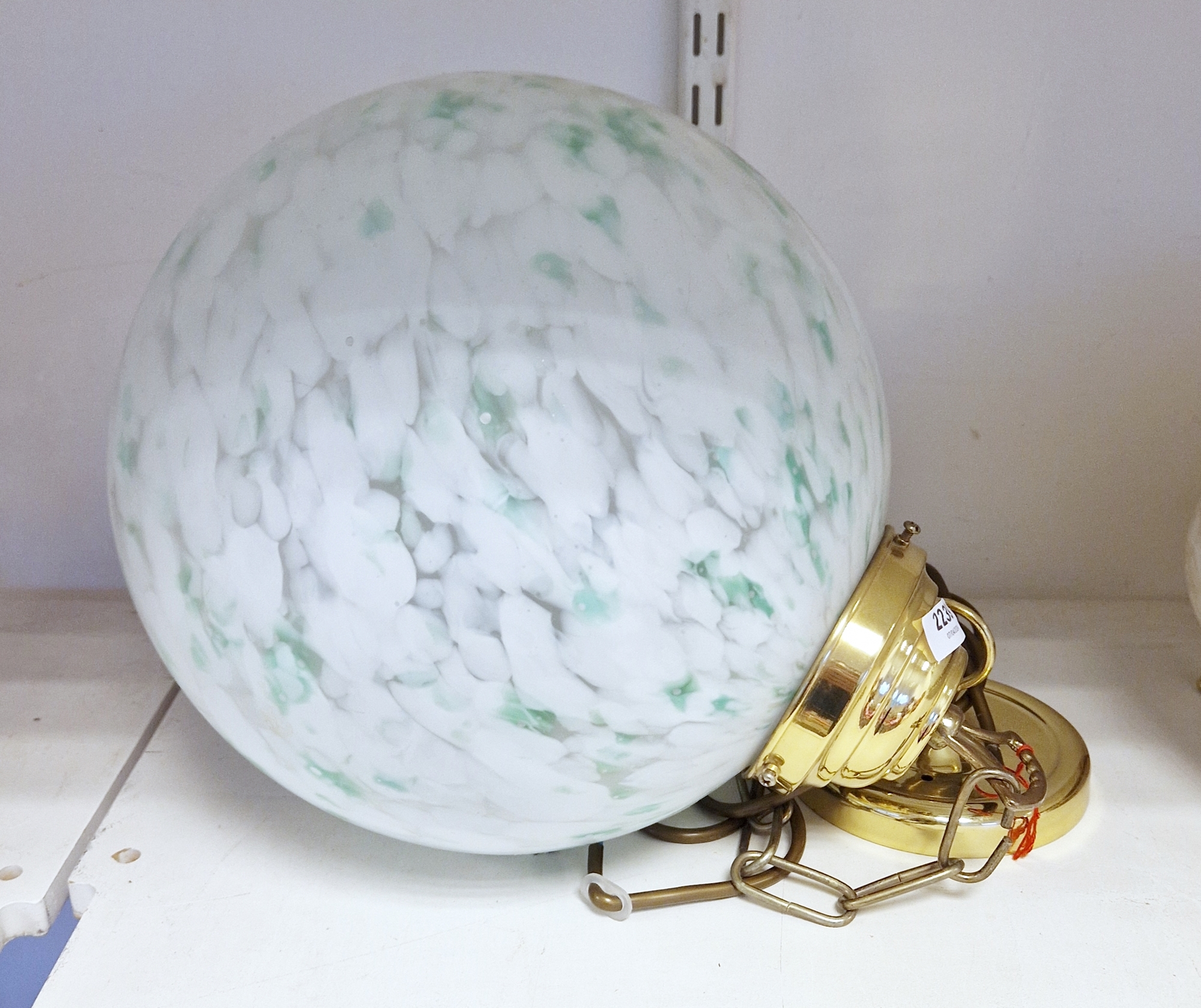 Contemporary large opaque glass globe-shaped pendant light with gilt-metal fittings, in the Art Deco