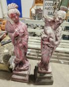 Henri Studio Inc. composite stone garden statue on base of an eastern robed gentleman holding a