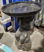 Bird bath, the base of reconstituted stone, in the form of a young boy, the top glazed stoneware