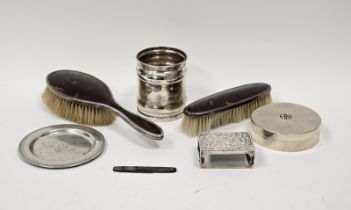 A George V silver and tortoiseshell hairbrush and clothes brush, Birmingham 1926; together with a