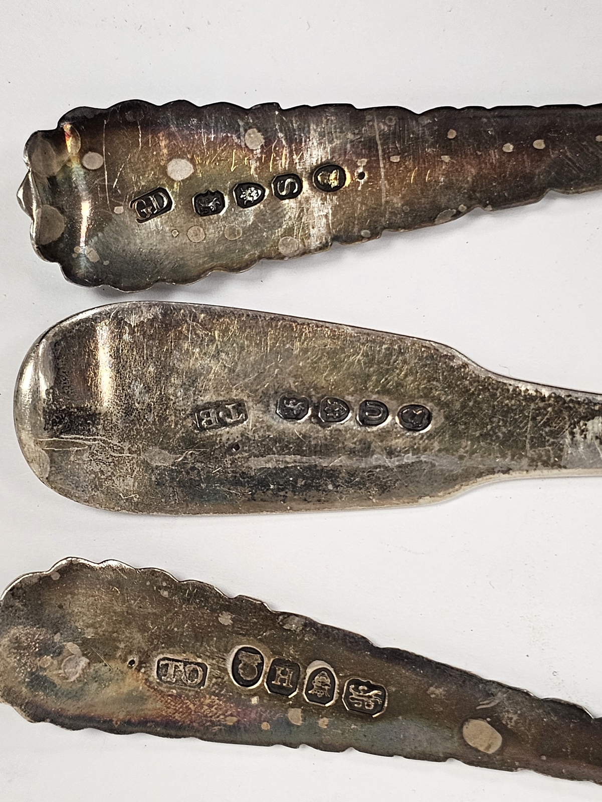 Three George III silver tablespoons, one fiddle pattern, London 1815, the other two London 1803 - Image 2 of 2