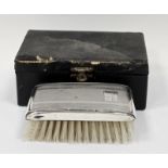 Elizabeth II silver backed engine turned clothes brush, in leather box, engraved with initials and