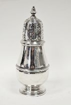 A George VI silver baluster shape sugar caster, the pierced detachable cover with knop finial, the