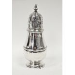 A George VI silver baluster shape sugar caster, the pierced detachable cover with knop finial, the