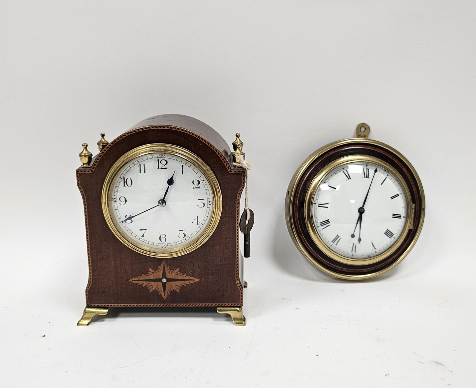 Early 20th century arch topped mantel clock with brass urn finials and inlaid decoration, 17cm