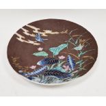 Early 20th century Japanese porcelain charger, painted in underglaze blue with water plants and