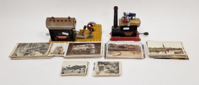 Mamod stationary steam engine with burner, a Meccano steam engine and a collection of postcards