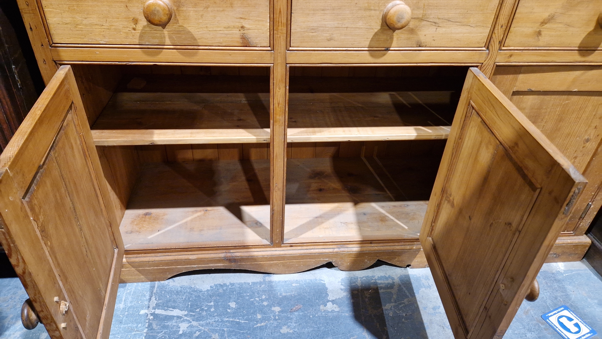 19th century pine kitchen dresser, the top section with two plateracks and five short drawers, the - Image 17 of 17