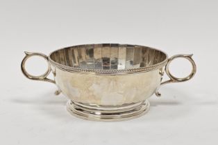 George V silver twin-handled sugar bowl, the reeded rim with panelled bowl, Birmingham 1930 by