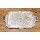 Large Sheffield silver-plated two-handled tray, the border cast with fruiting vine, engraved with