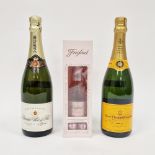 Bottle of Veuve Clicquot Ponsardin champagne, a Bouche Pere et Fils champagne and a 200ml Cava