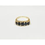 18ct gold five-stone sapphire and diamond dress ring set five oval sapphires interspersed by eight