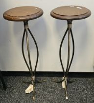 Pair of contemporary torchere stands on stylised brass-effect tripod legs, each with makers label