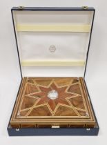 Pedro Duran silver chess set housed in a walnut and mahogany inlaid marquetry case, the inlaid lid