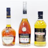 Bottle of Remy Martin VSOP limited edition by Vincent Levoy, one of Courvoisier VS Cognac and a