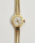 Bucherer lady’s 18ct gold wristwatch, the circular dial with engine-turned border, on woven mesh
