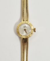 Bucherer lady’s 18ct gold wristwatch, the circular dial with engine-turned border, on woven mesh