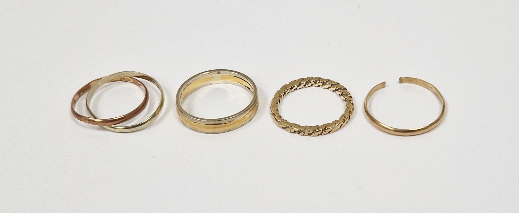 22ct gold wedding band, 3.4g, 9ct ropetwist ring, 2g approx., 9ct gold double ring and 9ct gold fine