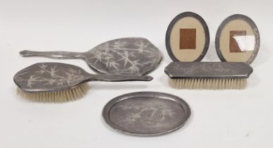 Tackhing Hong Kong sterling four-piece dressing table set to include hand mirror, hair brush,