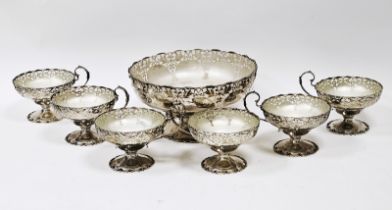 Silver dessert set by Mappin & Webb Limited, Sheffield 1948, comprising a pedestal fruit bowl of