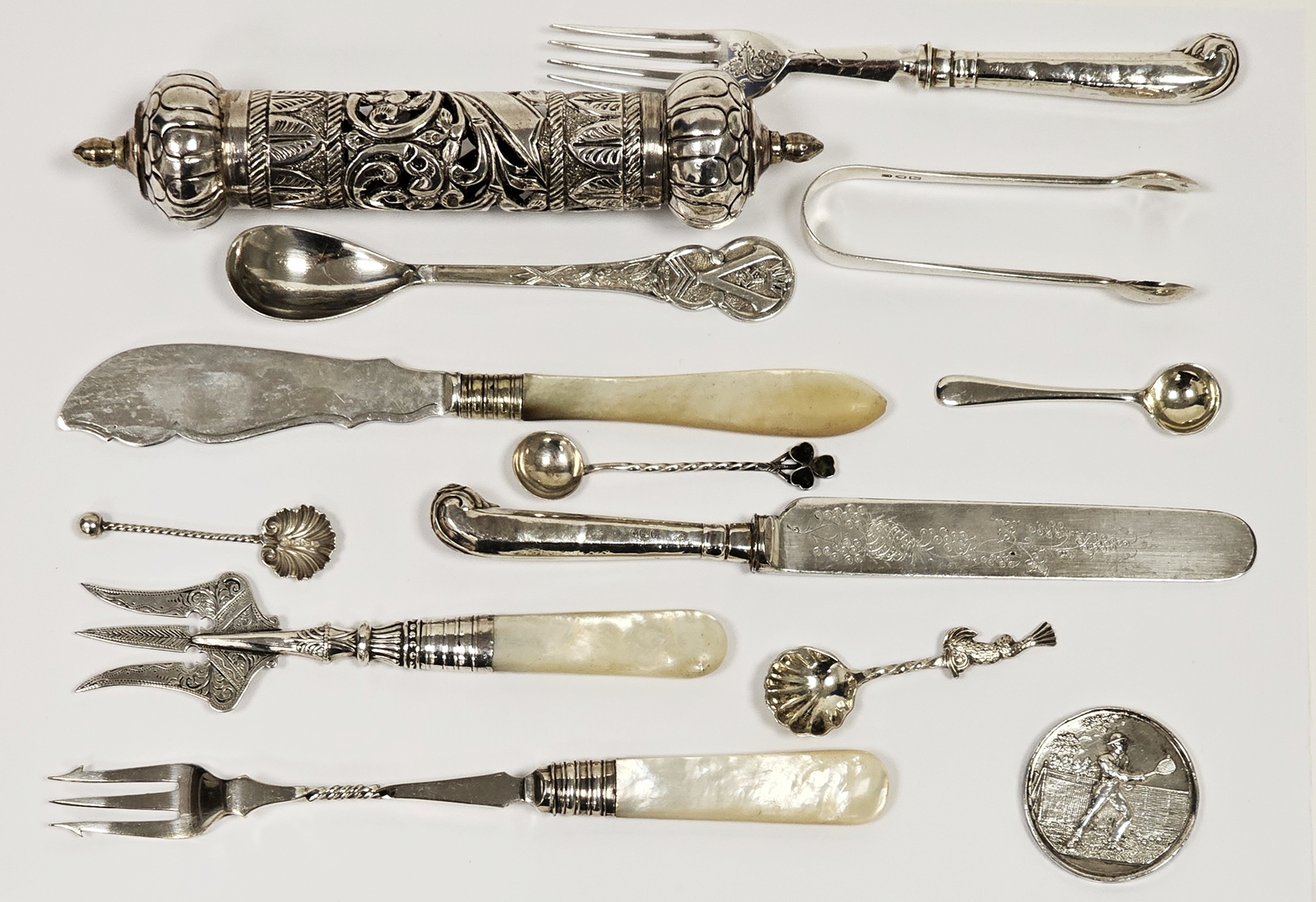 Edwardian bread fork with engraved silver tines and mother-of-pearl handle, a silver-coloured