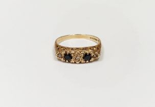 9ct gold, sapphire and diamond ring set two sapphires and three small diamonds, in illusion setting