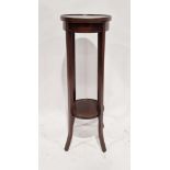 Edwardian mahogany jardiniere stand of circular form with inlaid stringing, 96cm high x 33cm