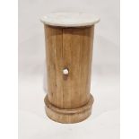 Marble-topped pine pot cupboard of cylindrical form, with ceramic handle, 74cm high x 39cm diameter