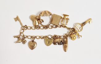 9ct gold oval loop charm bracelet with padlock clasp and multiple charms including scales and