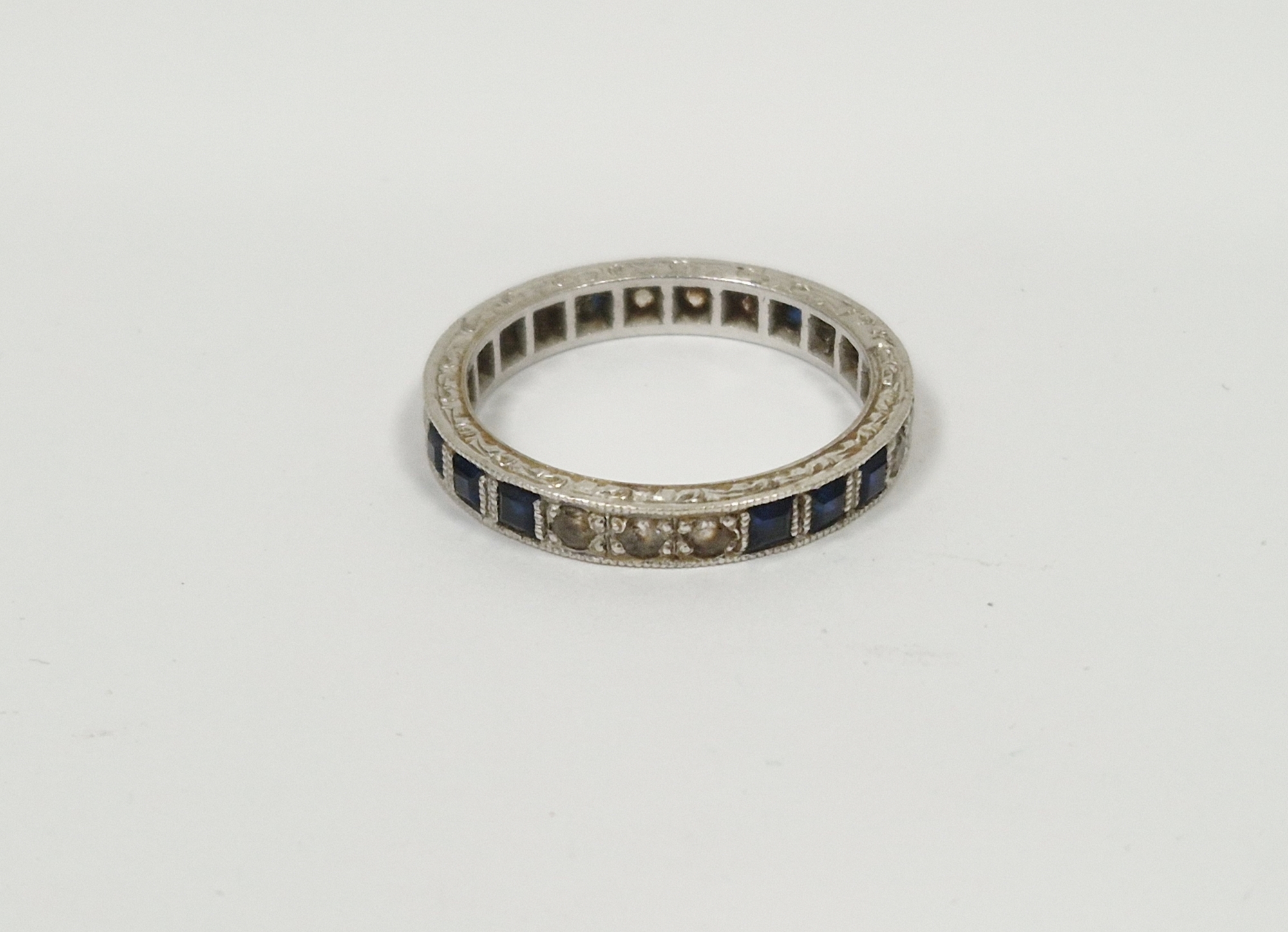 9ct white gold, blue and white stone eternity ring