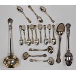 A matched set of George IV and William IV silver spoons, including a large silver serving ladle,