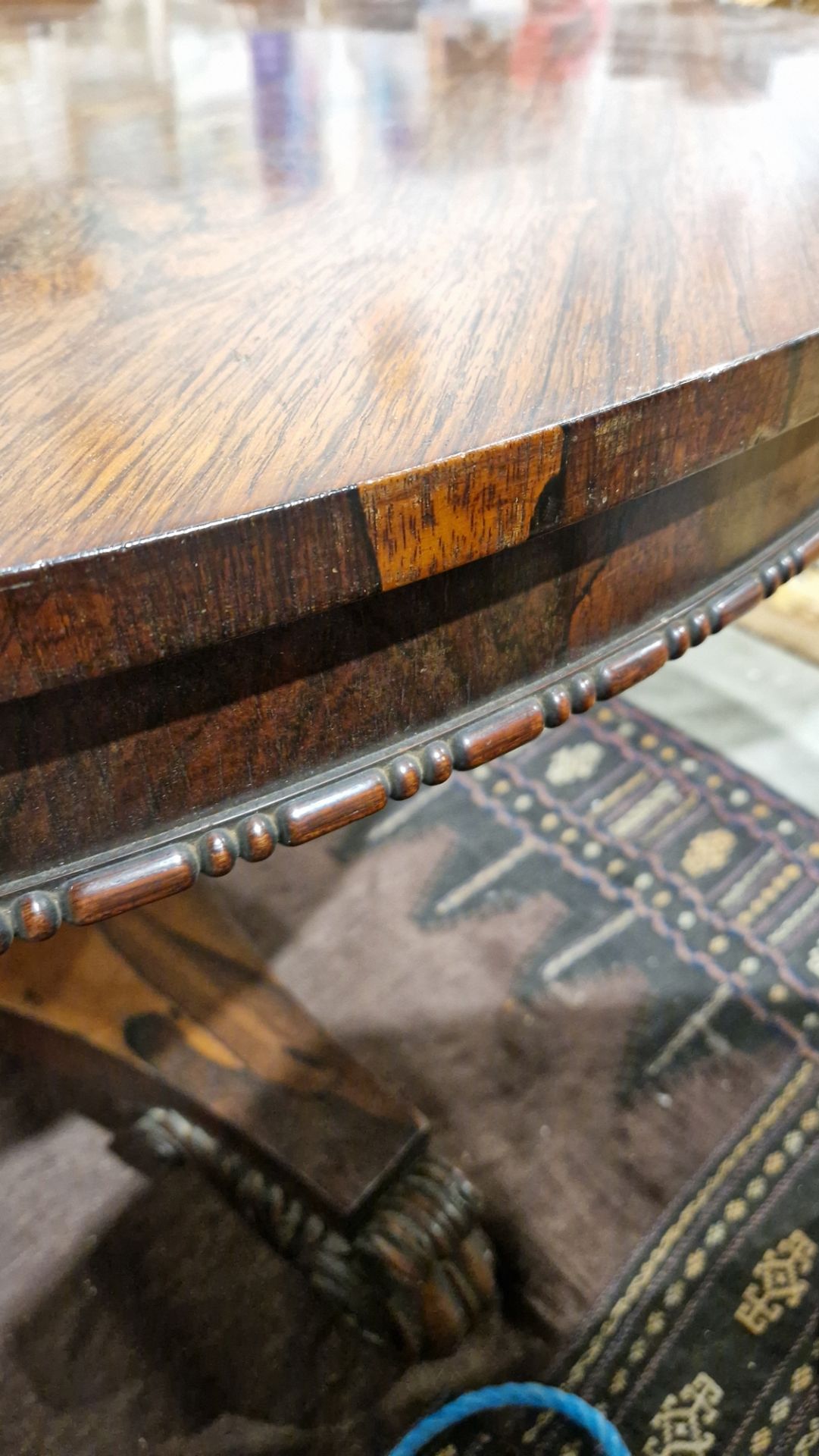 Large early Victorian rosewood tilt-top dining table of circular form, with carved floral central - Image 15 of 30