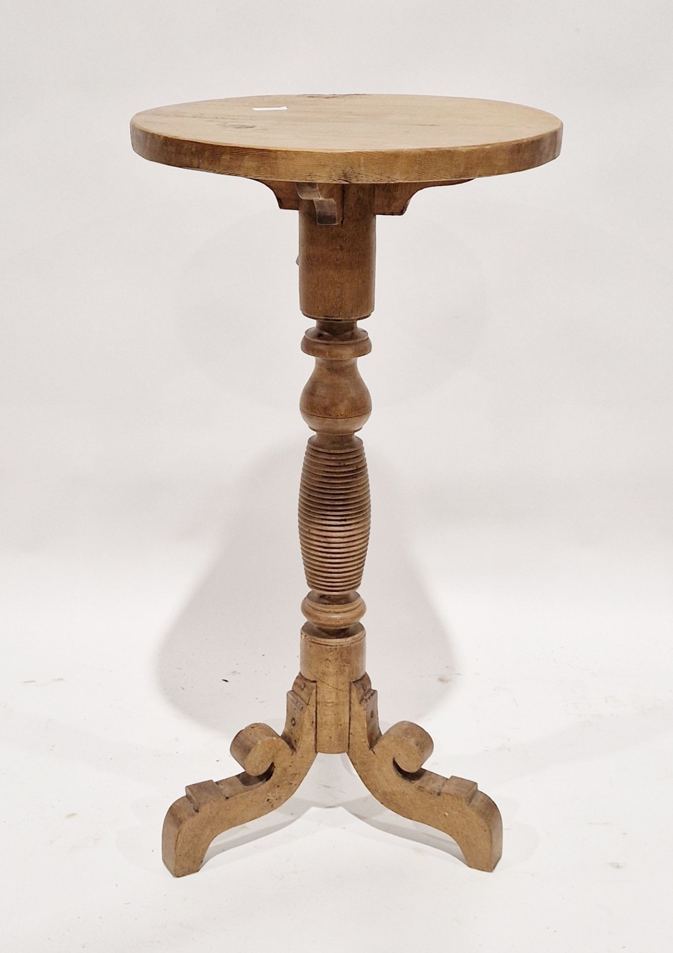 Late 19th/early 20th century pine wine table of circular form, with turned pedestal pillar, on