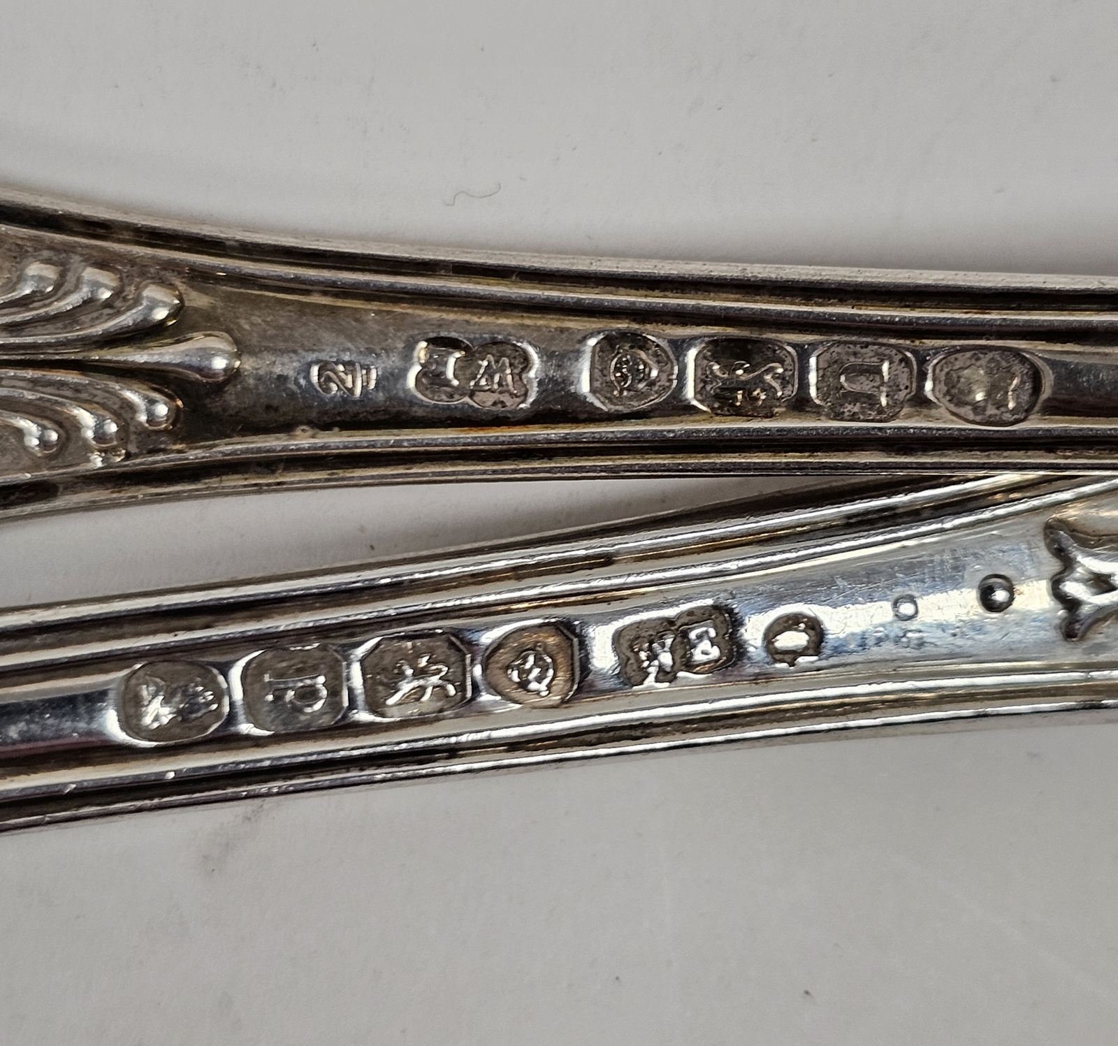 A set of four George IV Queen's pattern silver condiment spoons, London 1829; together with three - Image 2 of 3
