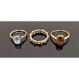 9ct gold and blue stone set ring and a 9ct gold, a white stone set eternity ring and a gold-coloured