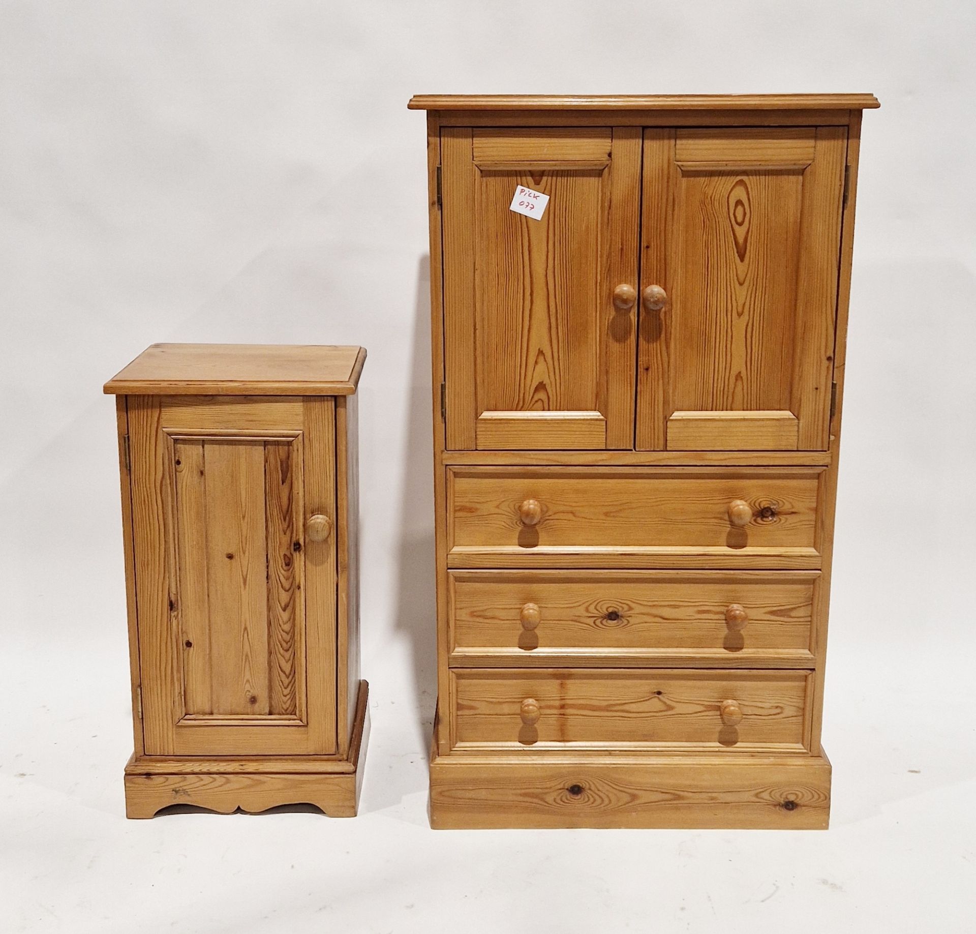 Modern pine storage unit comprising a two-door cupboard, over three long drawers, 111cm high x