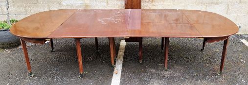 Mahogany dining table of D-shaped ends, circa 1800, fitted a pair of wide leaves, each 81.5cm wide