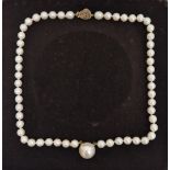 String of cultured pearls with central large mounted blister pearl, on 9ct gold clasp, cased