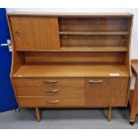 Avalon mid-century teak wood highboard having a raised open back top with a single shelf, sliding