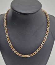 9ct three-colour gold chevron-pattern necklace, 16g approx.