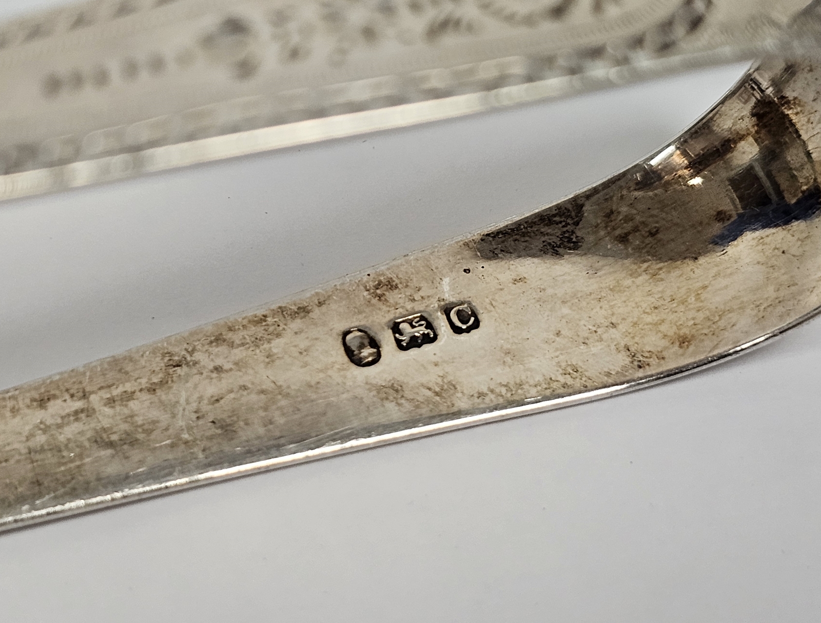 Pair of George III silver sugar tongs, London 1818, with engraved bright cut decoration, a pair of - Image 3 of 9